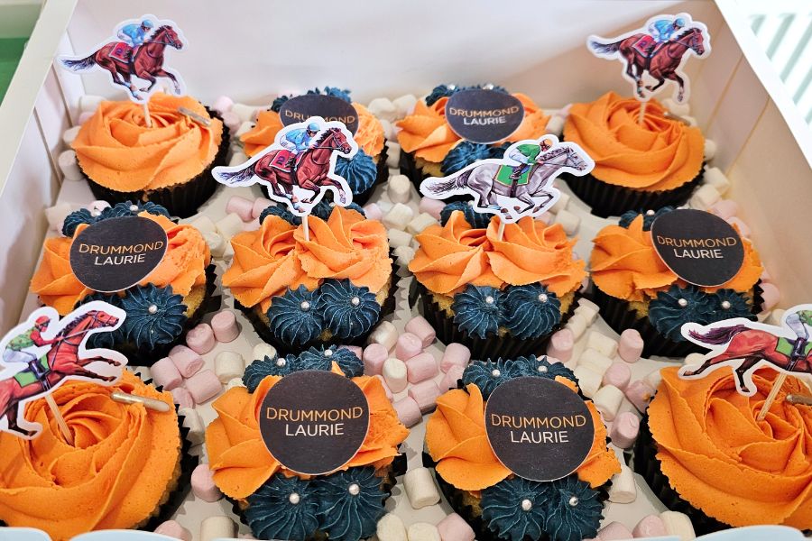 Image of Drummond Laurie Chartered Accountants branded cupcakes served as part of their 13th birthday celebrations in August 2026.